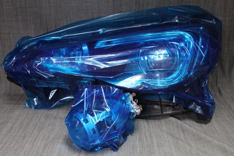 N車両様よりお預かりしたBRZのヘッドライトと取り外したプロジェクターの受取時の状態